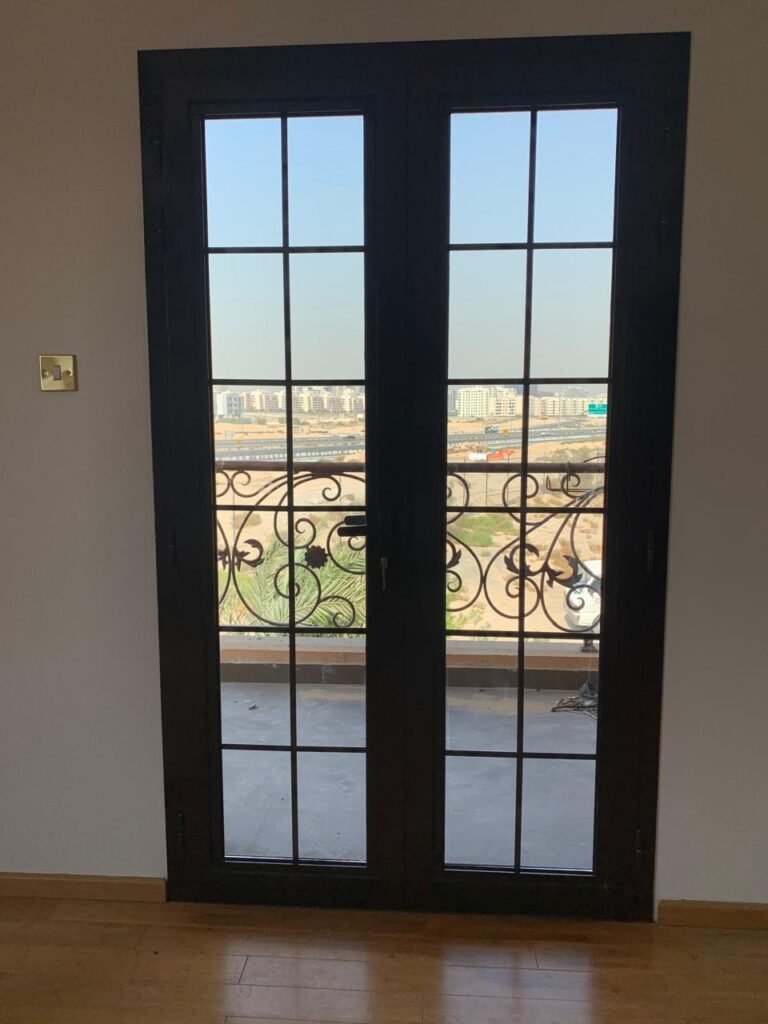 Bronze French door to balcony